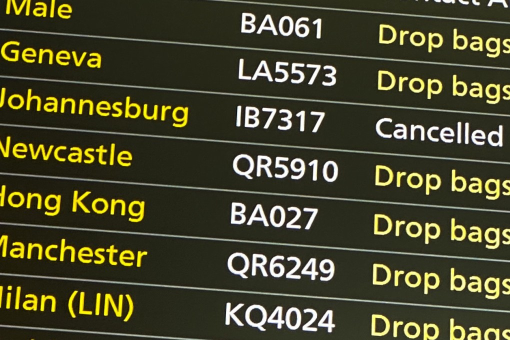 A departures screen displays a cancelled flight to Johannesburg at London Heathrow Airport on November 26. The UK is one of many countries to have banned flights from South Africa and other southern African countries, concerned passengers could be infected with the new “Omicron” variant. Photo: AP
