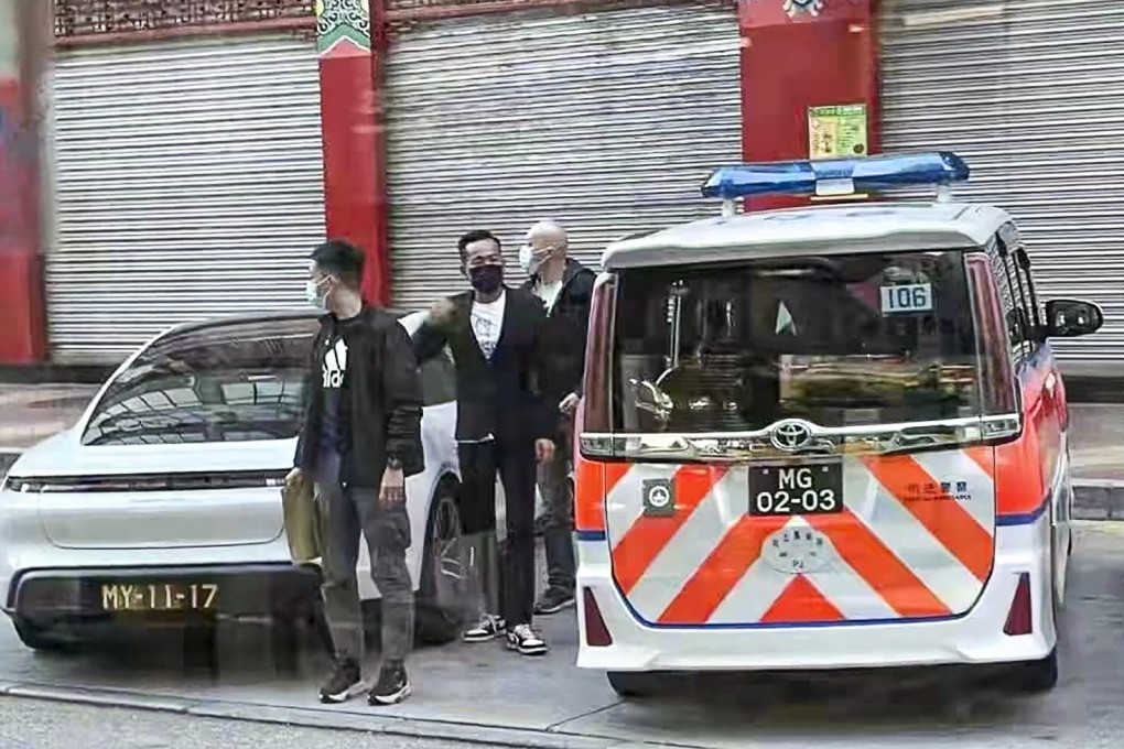 Macau officers take Alvin Chau to a local police station to help with their investigation into alleged gambling offences. Photo: Facebook