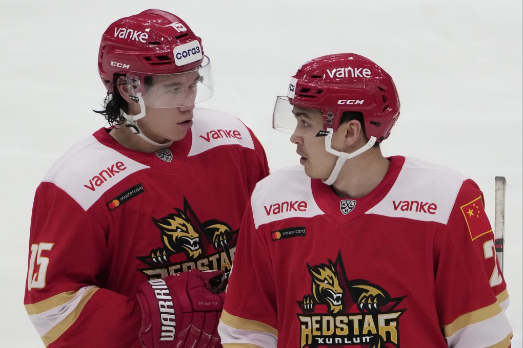 Kunlun Red Star’s Spencer Foo (left) and Jason Fram during their Kontinental Hockey League ice hockey game against Avangard Omsk in Mytishchi, outside Moscow, Russia, on November 17, 2021. Photo: AP
