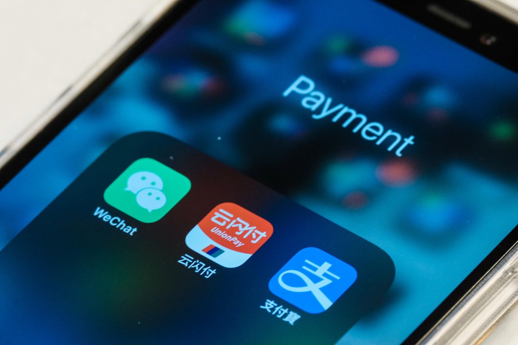 WeChat, Uniopay and Alipay mobile app icons are seen on an iPhone. Photo: SCMP Pictures