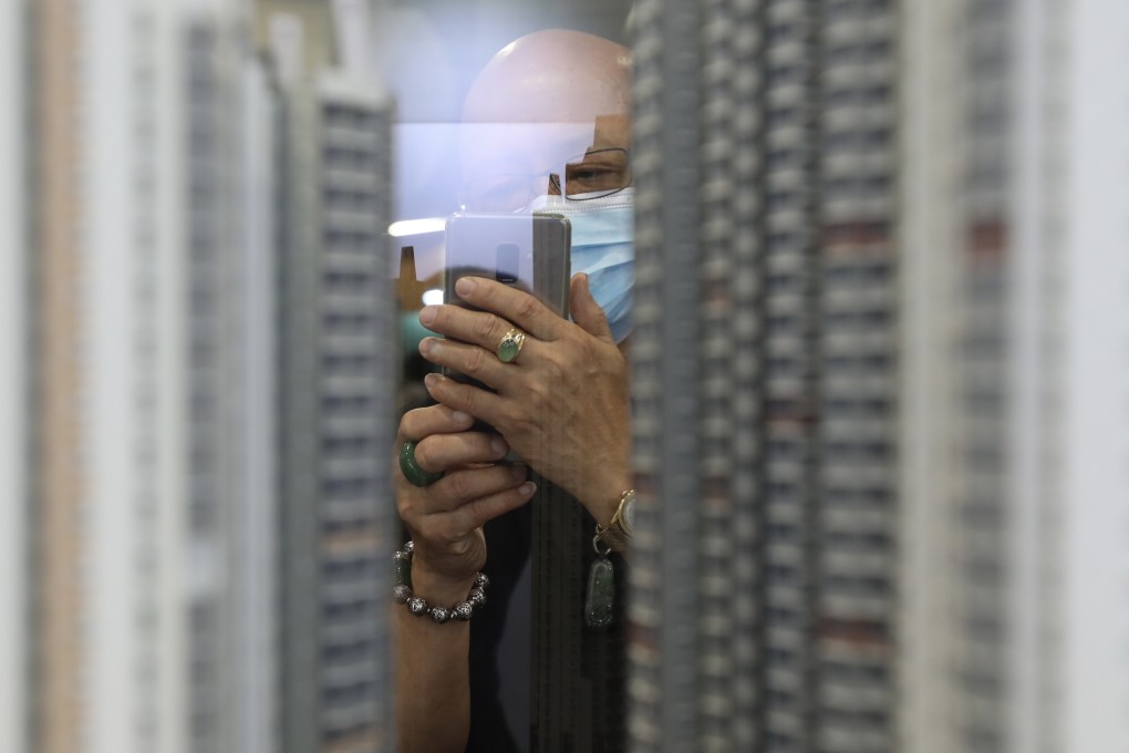 Successful applicants for the 2020 Home Ownership Scheme choose their flats. Photo: Xiaomei Chen