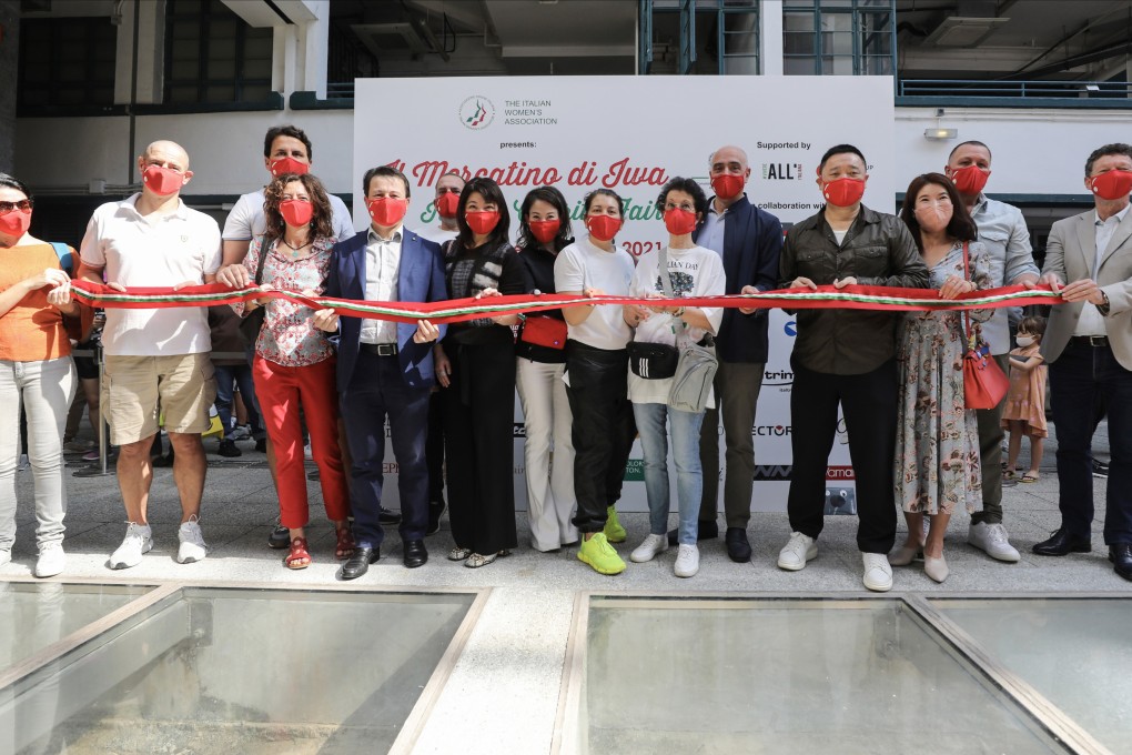 Committee members and partners cut the ribbon at this year’s Italian Charity Fair, organised by the Italian Women’s Association. Photo: Xiaomei Chen