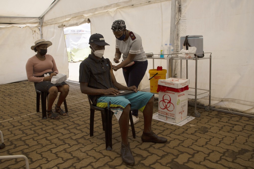 A man receives a dose of a Covid-19 vaccine at a vaccine centre, in Soweto on Monday, as South Africa deals with an increase in coronavirus cases. Photo: AP
