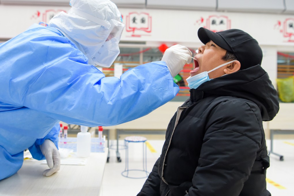A resident in Manzhouli, north China’s Inner Mongolia Autonomous Region, receives a nucleic acid test on November 29, 2021. China is on alert for signs of the newly discovered Omicron variant, which an expert says is likely to enter the country. Photo: XInhua