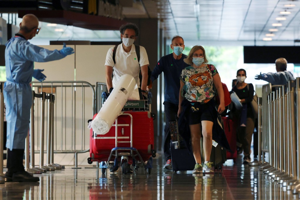 Passengers arrive at Changi Airport. File photo: Reuters
