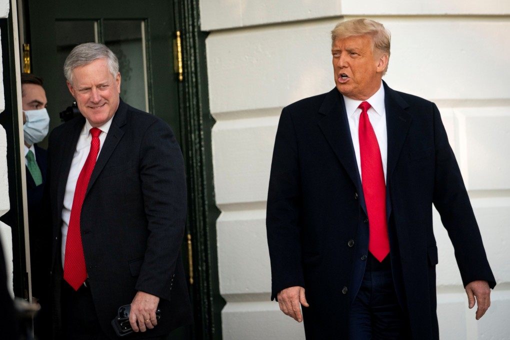Then US President Donald Trump departs from the White House with Chief of Staff Mark Meadows (left) to travel to North Carolina for an election rally in October 2020. Photo: Reuters