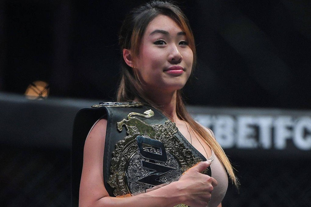 Angela Lee holds her ONE atomweight title inside the Circle. Photos: ONE Championship