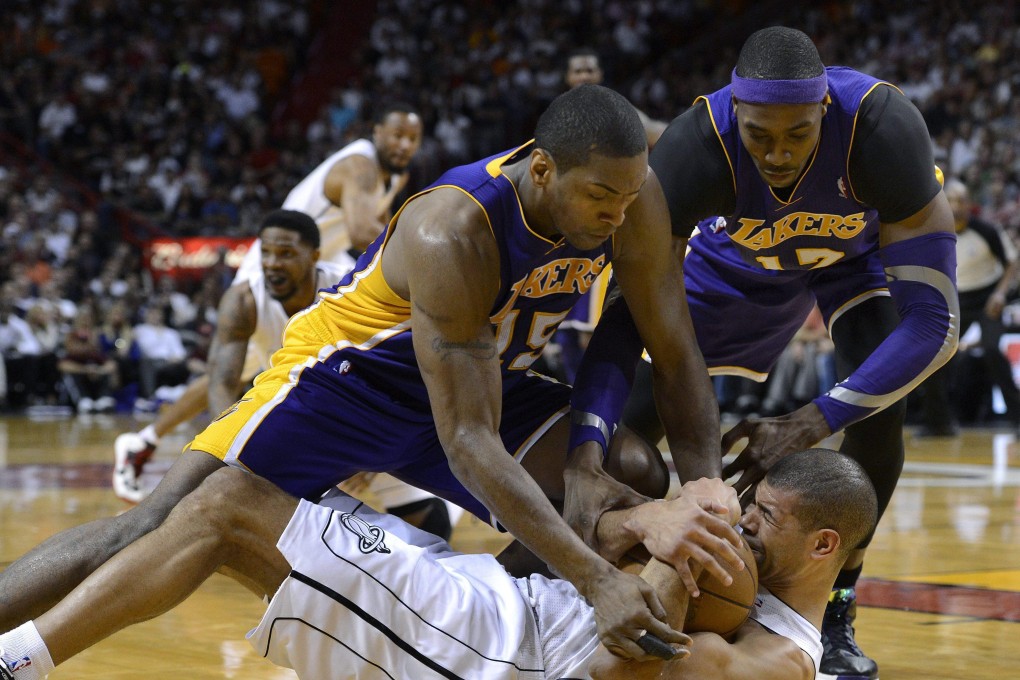 Former Miami Heat forward Shane Battier (bottom) and ex-Los Angeles Laker Metta World Peace (l) have joined the investors in East Asia Super League. Photo: EPA