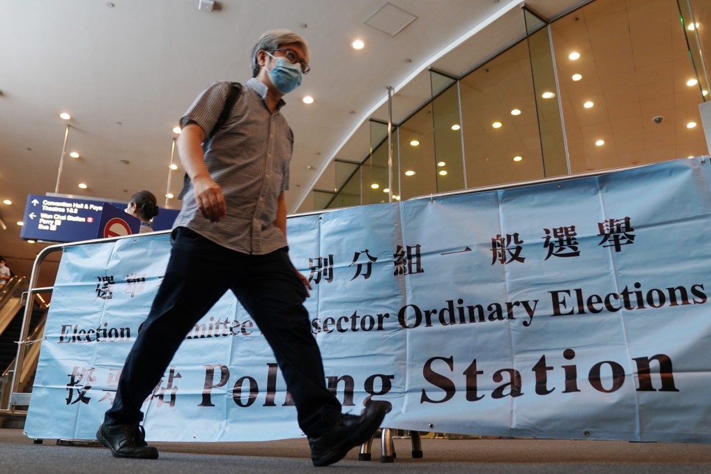 A voter leaves a Hong Kong polling station on September 19 during the Election Committee’s subsector ordinary elections. Photo: Xinhua