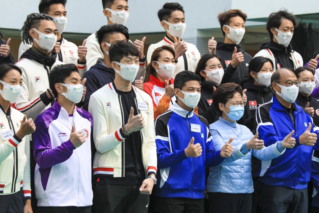 Carrie Lam (second from right) and Edgar Cheung (third from left) at Lam Tai Fai College on Thursday. Photo: Felix Wong