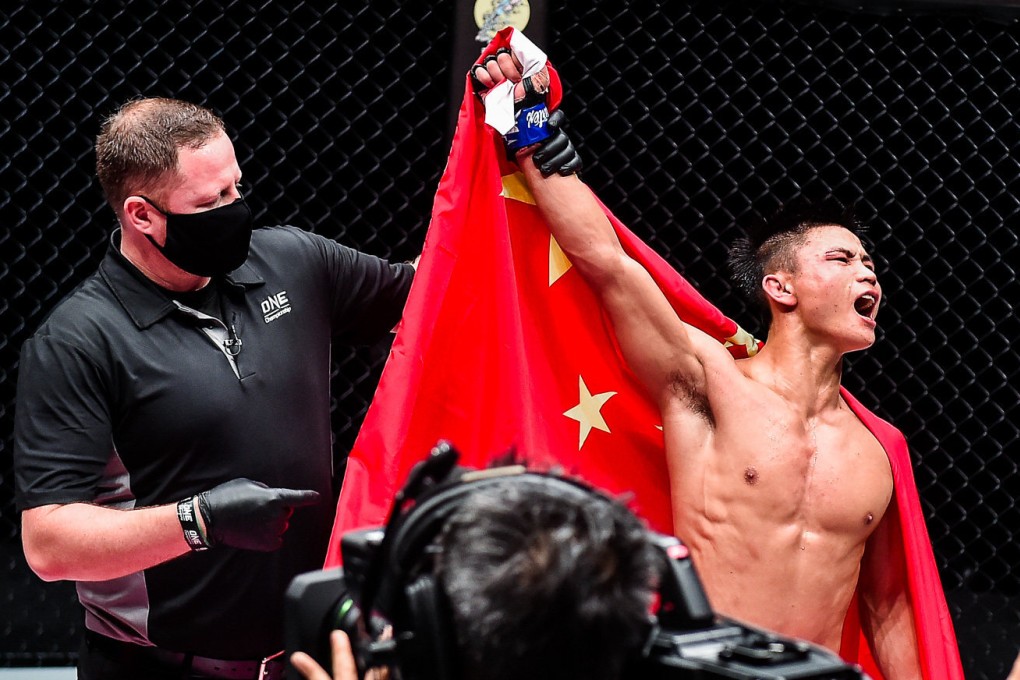 Hu Yong celebrates his decision win over Yodkaikaew Fairtex. Photos: ONE Championship