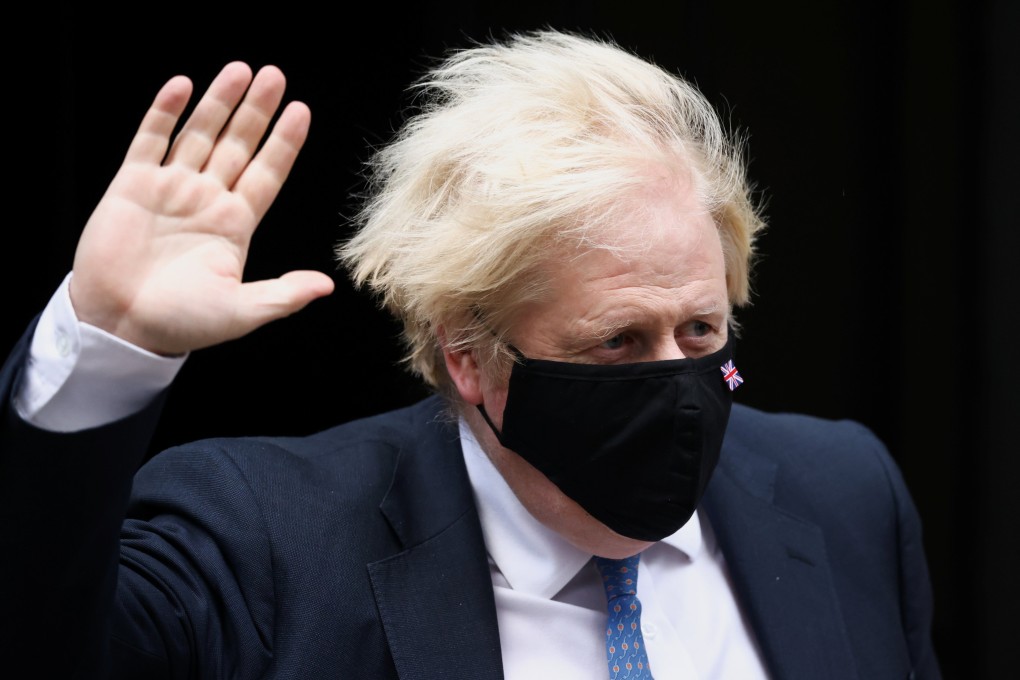 UK Prime Minister Boris Johnson gestures as he walks outside Downing Street in London on Wednesday. Photo: Reuters