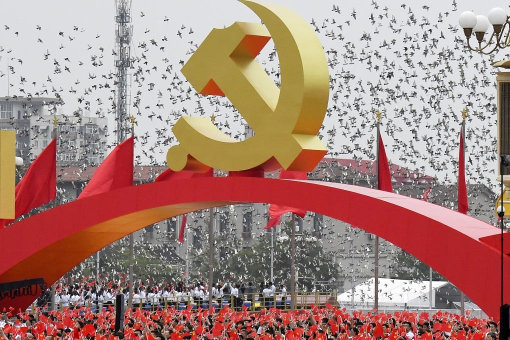 Tens of thousands of people attend an event in Tiananmen Square marking the Communist Party’s centenary on July 1. There was a downpour soon after the two-hour ceremony ended. Photo: Kyodo