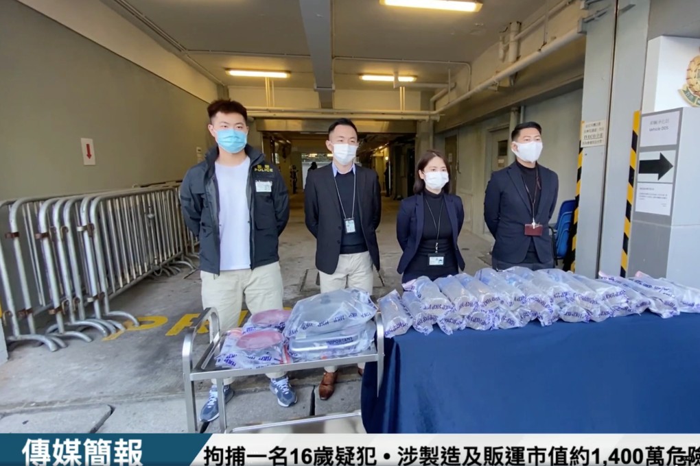 Hong Kong police pose with bottles that each held 1.5 litres of liquid cocaine. Photo: Facebook