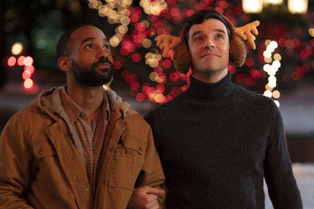 Philemon Chambers and Michael Urie in Single All The Way. Netflix’s first gay holiday romantic comedy is one that refreshingly avoids a coming out story and caters to a queer audience. Photo: Philippe Bosse/Netflix