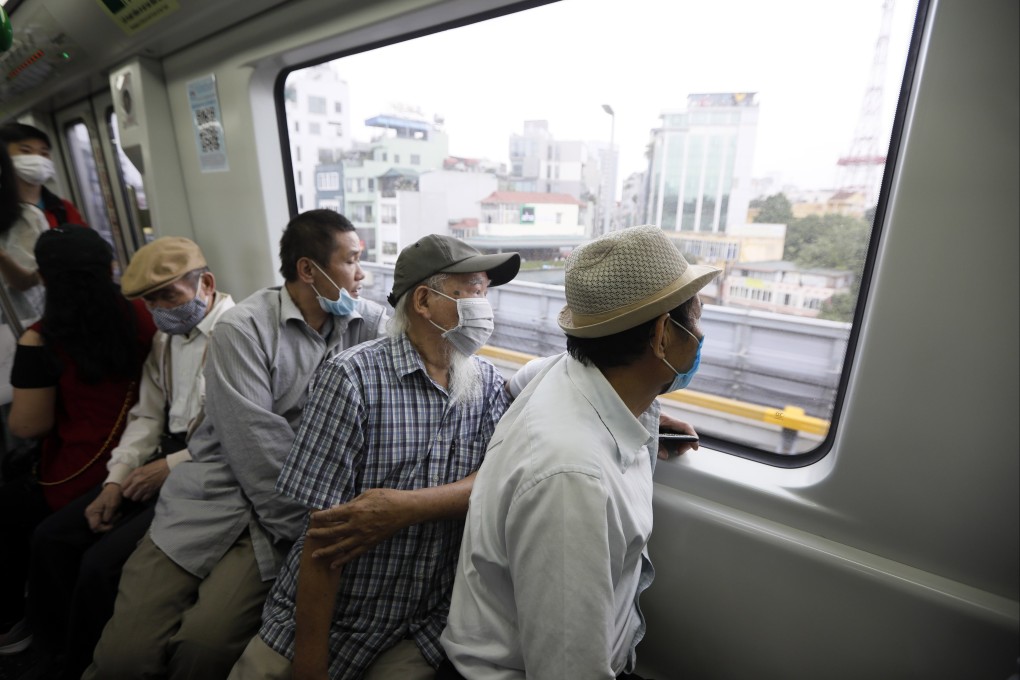 Vietnamese travel on the Cat Linh-Ha Dong urban railway line in Hanoi on November 6. Vietnam’s first metro line, built by a Chinese company, began operation in Hanoi last month after years of delays and a near-doubling of construction costs. Photo: EPA-EFE