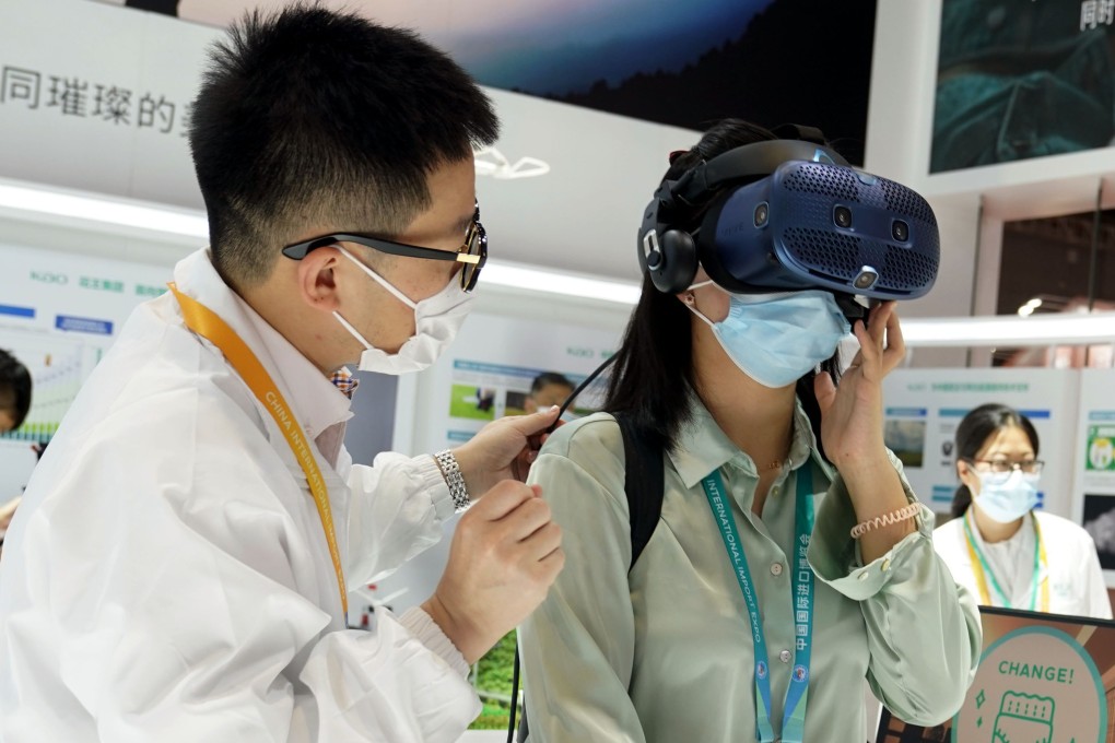 A visitor experiences a virtual reality headset at the 4th China International Import Expo in Shanghai last month. Photo: Xinhua