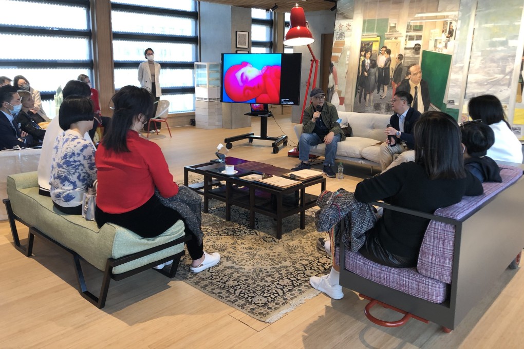 Chinese artist Zhang Xiaogang (wearing a cap) in conversation with Pi Li,  Sigg Senior Curator of M+, on December 2, 2021. The event was held at the M+ Lounge for  patrons of Hong Kong’s new museum of visual culture. Photo: Enid Tsui