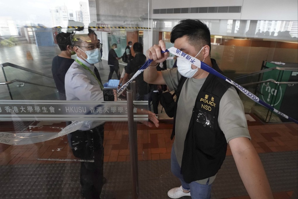 National security police raid the student union office at the University of Hong Kong in July. Photo: Felix Wong