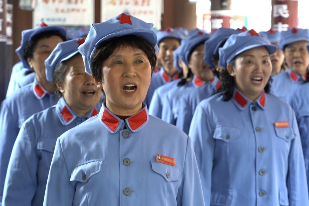 A group of local retirees gather to sing Red Army revolutionary songs in the city of Zunyi in Southwestern China’s Guizhou province. Photo: AP