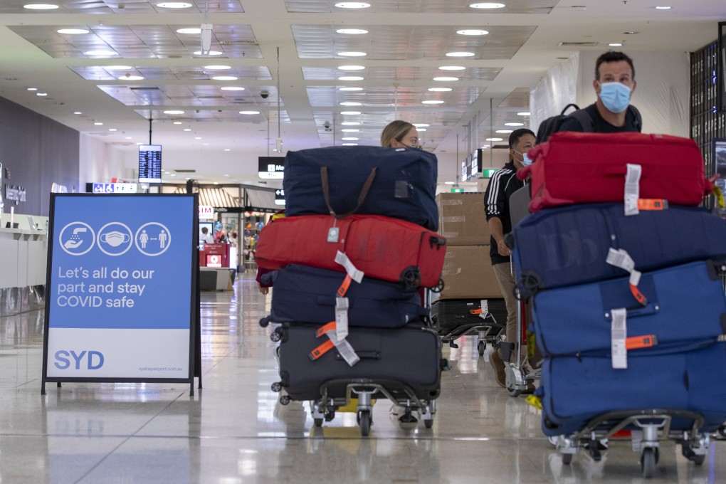 Passengers arrive at the airport in Sydney, Australia. Photo: Xinhua