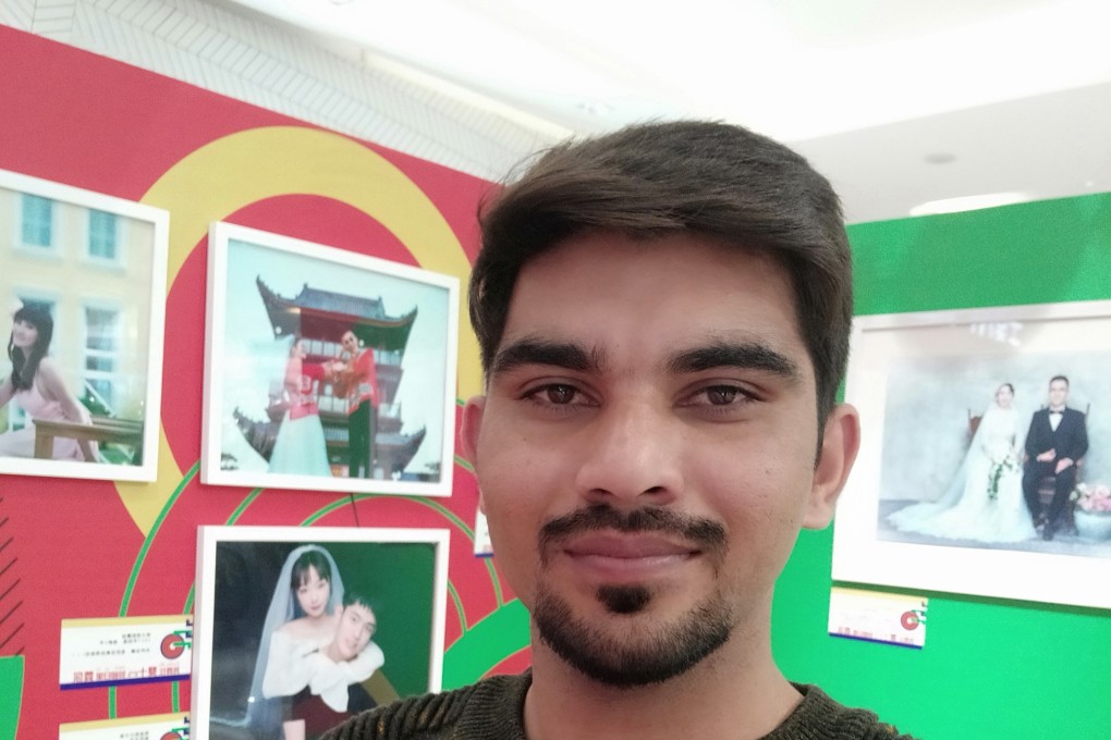 Rizwan Ali, pictured in Shandong in 2019, is now stuck in limbo - unable to go back to his old job in Pakistan and unable to return to China. Photo: Handout
