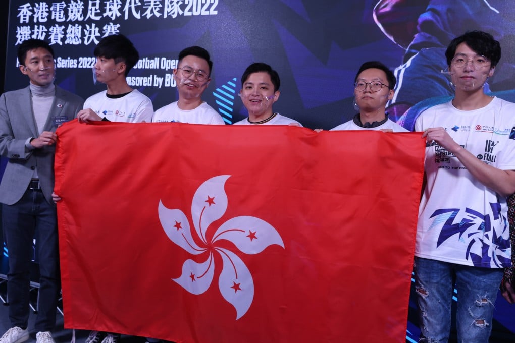 Hong Kong FIFAe Nations Series 2022 - HKFA eFootball Open Final PS4 winner Kenny Yung Shing-long (centre) with fellow national team representatives (from left) Lau Tsz-hei, Yip Suen-chi, Ronnie Yau Man-lung and Ken Ho Ka-ming at the CGA Esports Stadium in Mong Kok. Photo: SCMP / Dickson Lee
