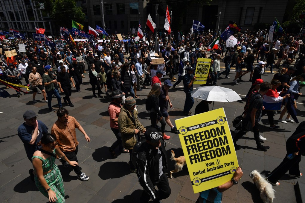 People participate in an anti-vaccination rally in Melbourne, Australia. Photo: EPA-EFE