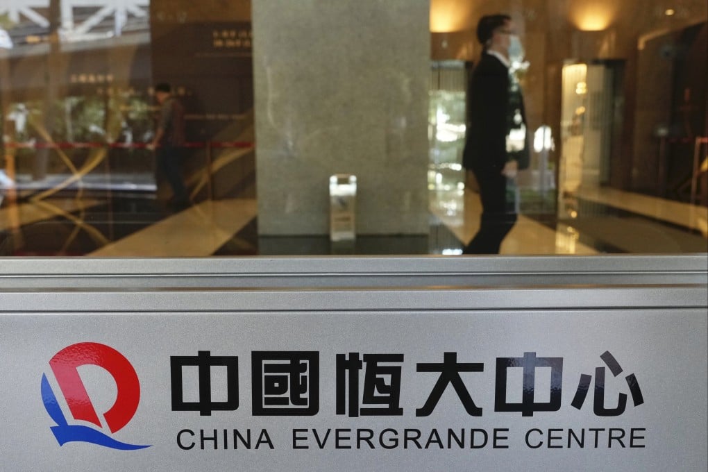 China Evergrande Group, struggling under more than US$300 billion of debt, has entered into a debt restructuring agreement overseen by the Guangdong provincial government. Photo: AP Photo
