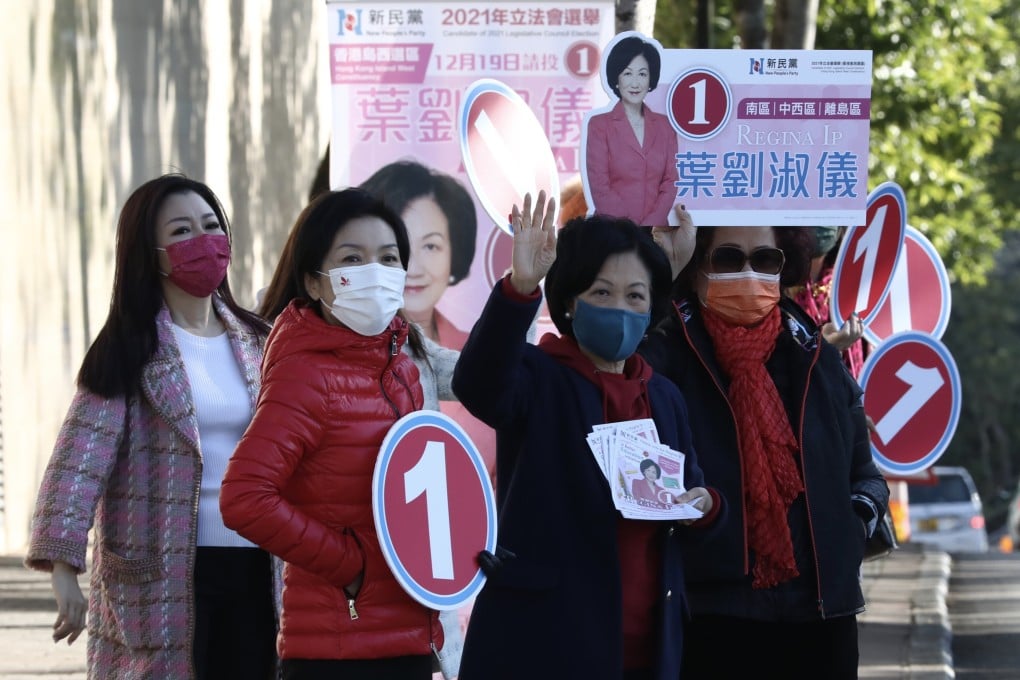 Regina Ip (second from right) and her supporters canvass for votes at The Peak on Friday. Photo: Jonathan Wong