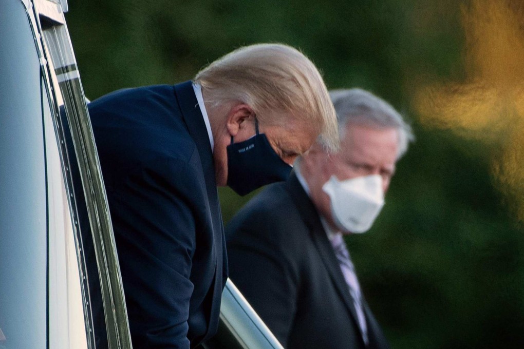 White House Chief of Staff Mark Meadows watches as then US president Donald Trump walks off Marine One at Walter Reed Medical Centre, after testing positive for Covid-19. File photo: AFP
