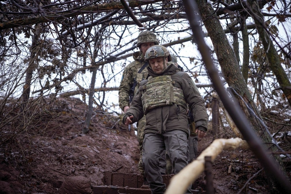 Ukrainian President Volodymyr Zelensky visits positions on the front line with pro-Russian militants in the Donetsk region on Monday. Photo: EPA-EFE