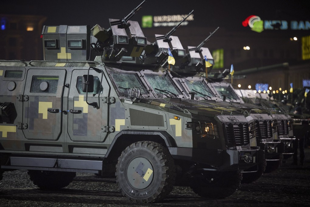 Troops and military vehicles take part in the Day of the Armed Forces of Ukraine celebration in Kharkiv on Monday. Ukrainian officials said Russia has amassed more than 90,000 troops along the border. Photo: Ukraine presidential press service via EPA-EFE