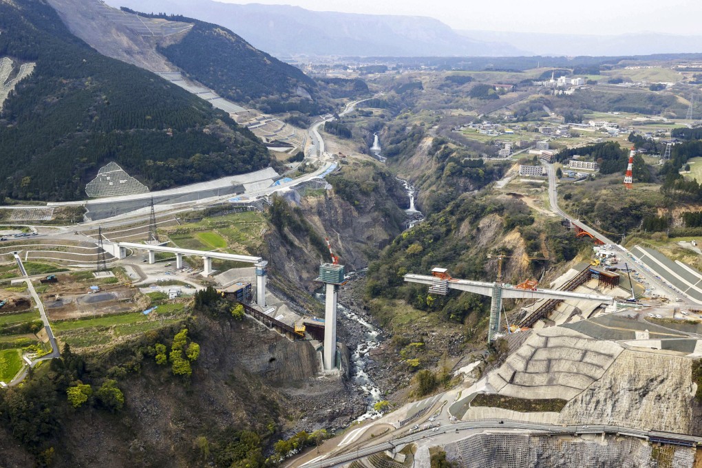 A photo taken on April 11, 2020,  shows Aso Ohashi bridge under reconstruction in the Kumamoto prefecture village of Minamiaso in southwestern Japan, which was brought down by a massive earthquake-triggered landslide in 2016. Photo: Kyodo