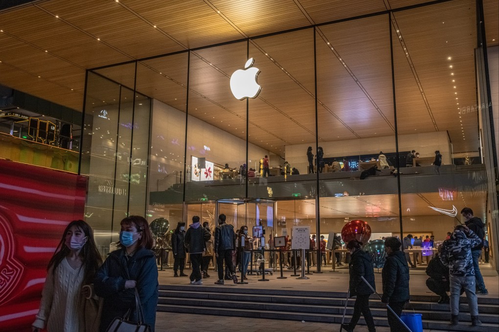 The Apple store in the Sanlitun shopping area in Beijing on December 8. Apple’s involvement is again raising questions after a report revealed that Tim Cook personally lobbied Chinese politicians for favorable treatment. Photo: EPA-EFE

People walk next to an Apple store at the Sanlitun shopping area in Beijing, China, 08 December 2021.  EPA-EFE/ROMAN PILIPEY