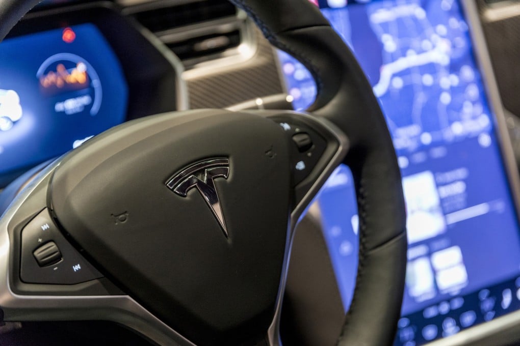 The US National Highway Traffic Safety Administration is looking into a complaint that Tesla drivers can play video games on a dashboard screen while their vehicle is moving. Photo: TNS