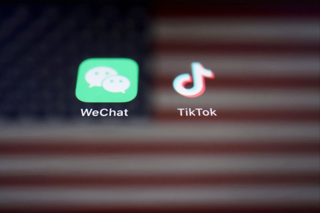 A reflection of the US flag seen on the signs of the WeChat and TikTok apps on September 19, 2020. Photo: Reuters