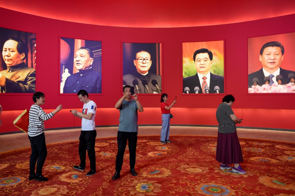 Portraits of, from left, former leaders Mao Zedong, Deng Xiaoping, Jiang Zemin and Hu Jintao, and Chinese President Xi Jinping at an exhibition marking the country’s achievements over the past 70 years. Photo: AFP