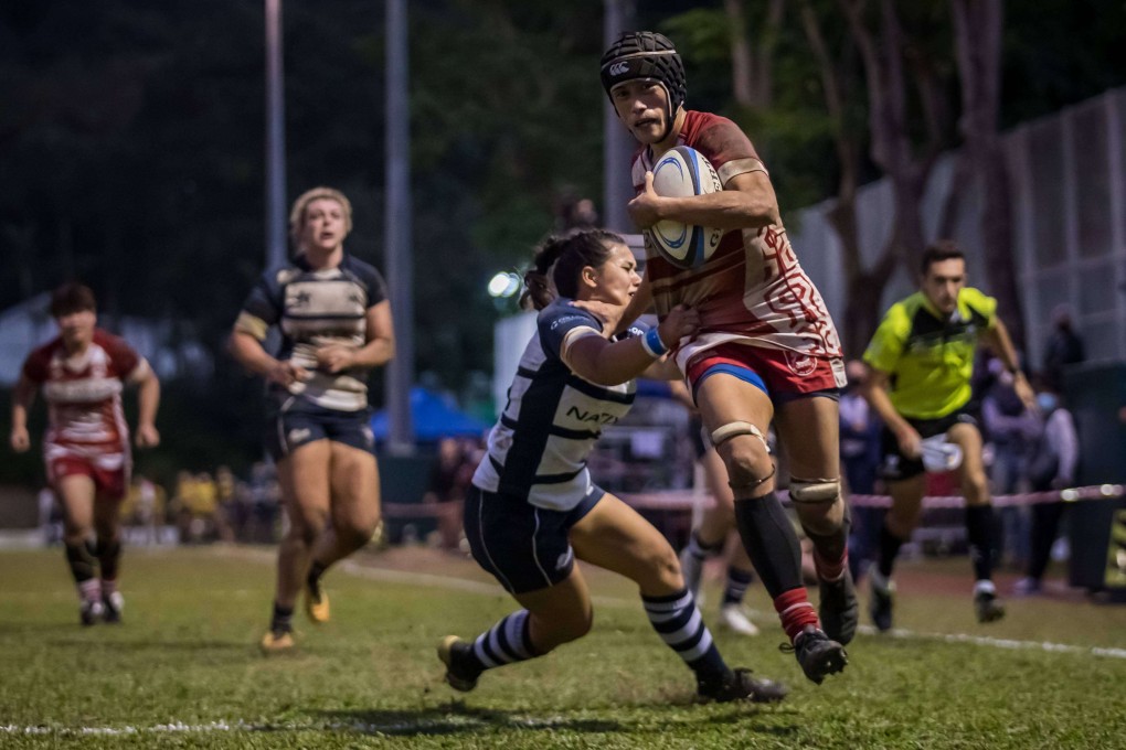 Chow Mei Nam muscles over for the score vs HKFC’s Rachel Fong. Photo: HKRU