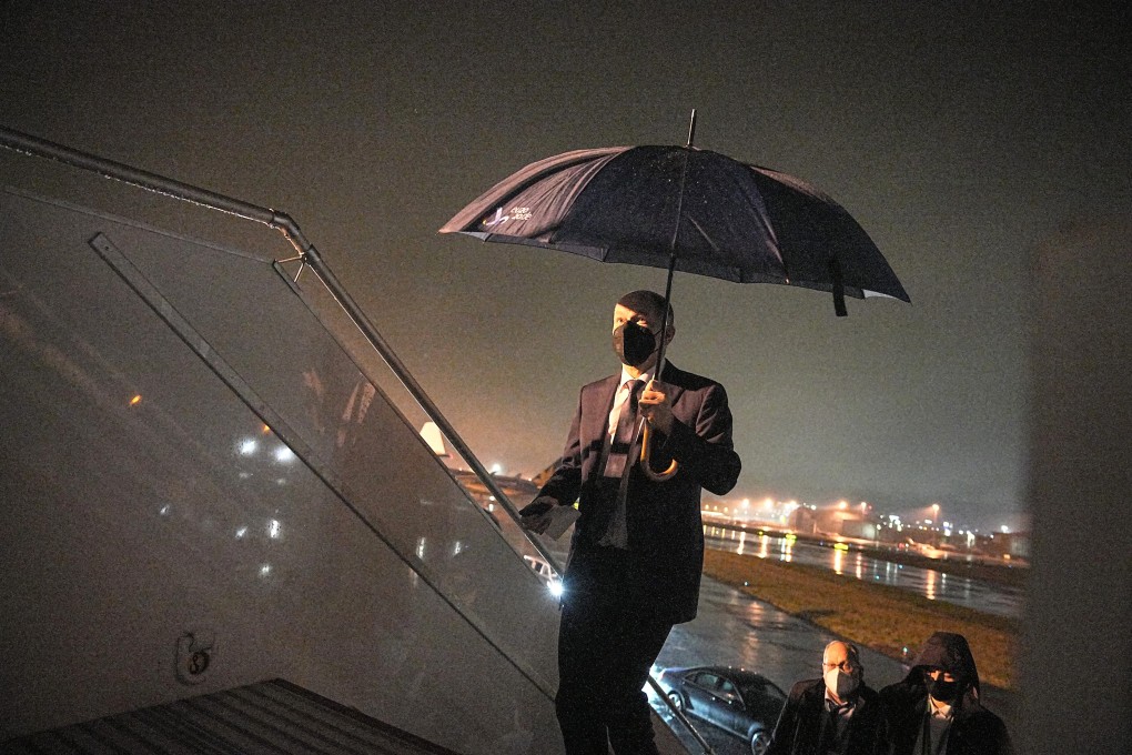 10 December 2021, Belgium, Brussels: German Chancellor Olaf Scholz boards the plane after his visits to Brussels. Photo: Michael Kappeler/dpa