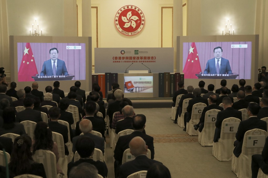 Xia Baolong, director of the Hong Kong and Macao Affairs Office, seen on twin video projections on Monday, is urging Hongkongers to vote. Photo: Edmond So