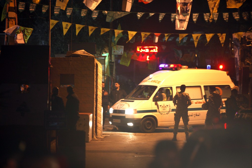 An ambulance enters the Burj Shamali Palestinian refugee camp in the southern port city of Tyre, Lebanon on Friday. Photo: AP
