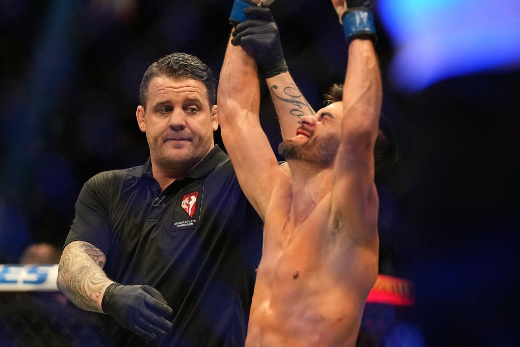 Dominick Cruz is declared the winner by unanimous decision against Pedro Munhoz at UFC 269. Photo: Stephen R Sylvanie/USA TODAY Sports