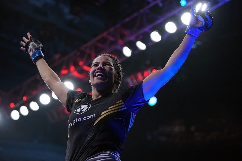 Julianna Pena celebrates her victory by submission against Amanda Nunes at UFC 269. Photo: Stephen R Sylvanie/USA TODAY Sports