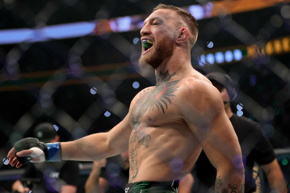 Conor McGregor walks in the Octagon before his lightweight bought against Dustin Poirier at UFC 264. Photo: AFP