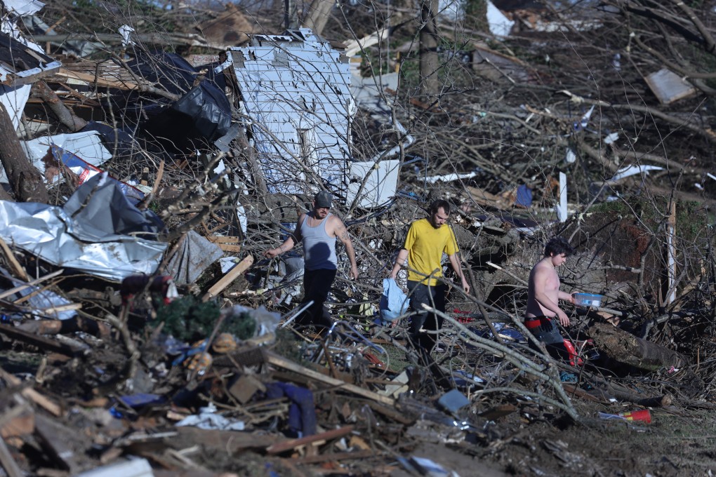 Residents of Mayfield, Kentucky salvage belongings from destroyed homes after a tornado tore through the town late Friday evening. Photo: TNS