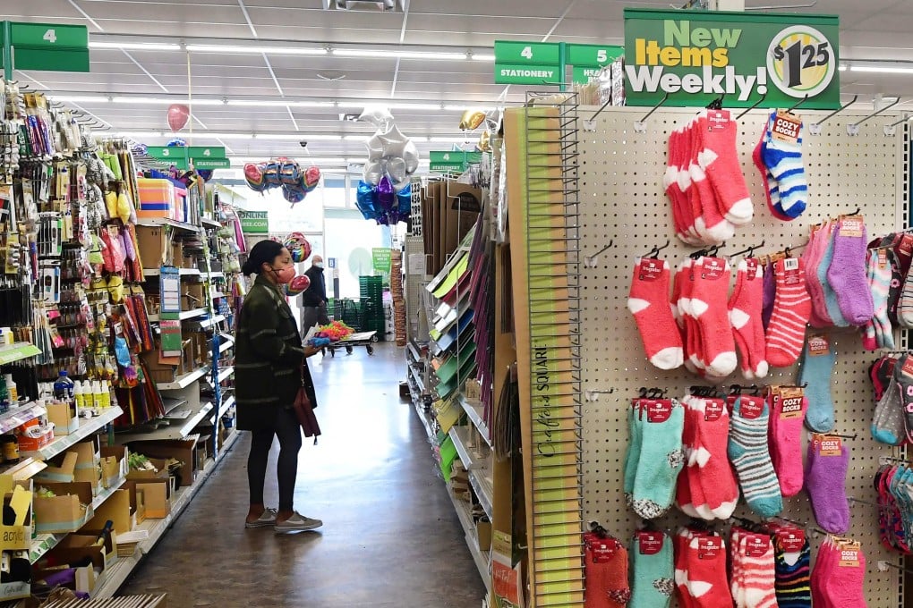 A woman shops at a Dollar Tree store where US$1.25 price tags are now posted on the shelves in Alhambra, California, on December 10. The store is known for its US$1 items, but prices have risen amid continued inflation. Photo AFP