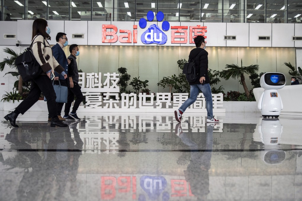 Employees walk through the lobby at Baidu headquarters in Beijing, March 4, 2021. Photo: Bloomberg