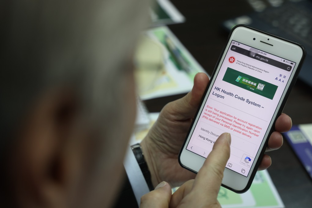 Danny Lau Tat-pong, honorary chairman of the Hong Kong Small and Medium Enterprises Association, was among the first group of residents trying to register for the Hong Kong Health Code. Photo: May Tse