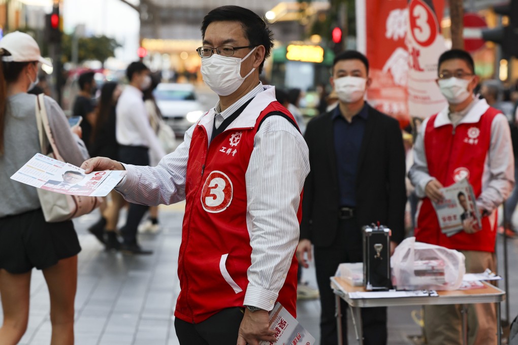 Volunteers for the Democratic Alliance for the Betterment and Progress of Hong Kong hand out pamphlets in Causeway Bay on December 11. Photo: Martin Chan